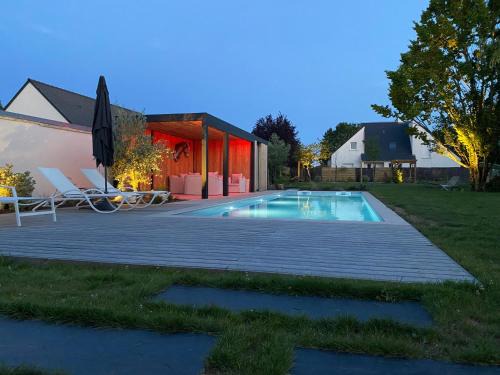 Larcay Apartment | Discover Le Céladon: Oceanfront with Pool & Hot Tub