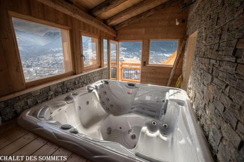 Puy-Saint-Pierre Ski Chalet | Oceanfront Getaway at Le Chalet des Sommets with Hot Tub