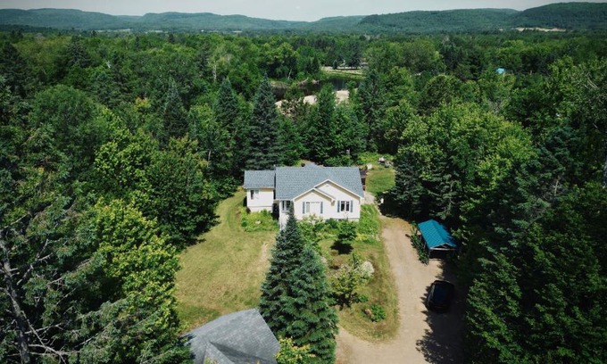Mandeville Apartment | Experience Le Chalet Jaune: Child-Friendly Retreat, Rated 10/10