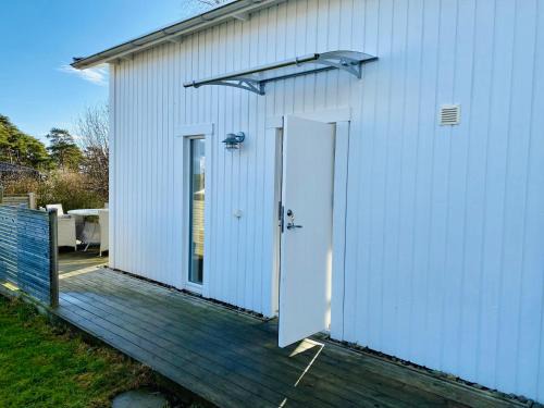Vickan Apartment | Relax at Le Chalet Onsala with Hot Tub & Family Amenities
