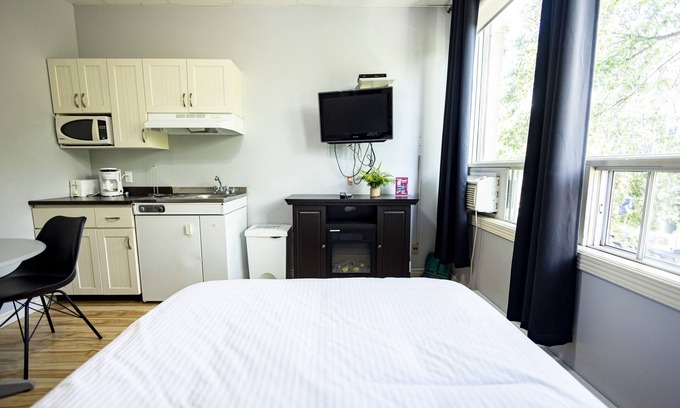 Rouyn-Noranda Apartment | Discover Comfort at Le Citadin with Spa & Breakfast Options
