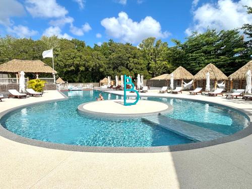 Grand-Bourg Apartment | Serene Beachfront Retreat at Blue Dream - Pool & Ocean Views