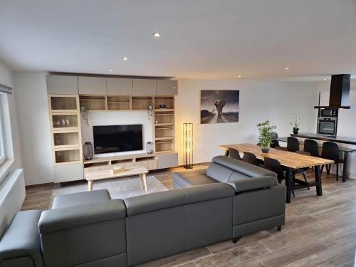 Baudour Apartment | Cozy Retreat: Pet-Friendly Haven with Great Guest Ratings