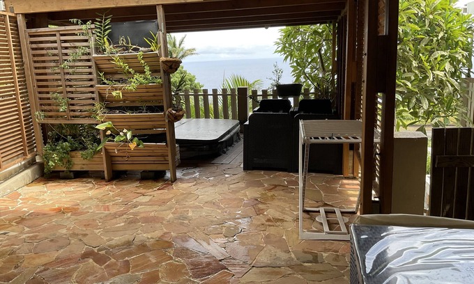 Petite-Ile Apartment | Relax at Le Corail: Private Jacuzzi & Oceanview Terrace