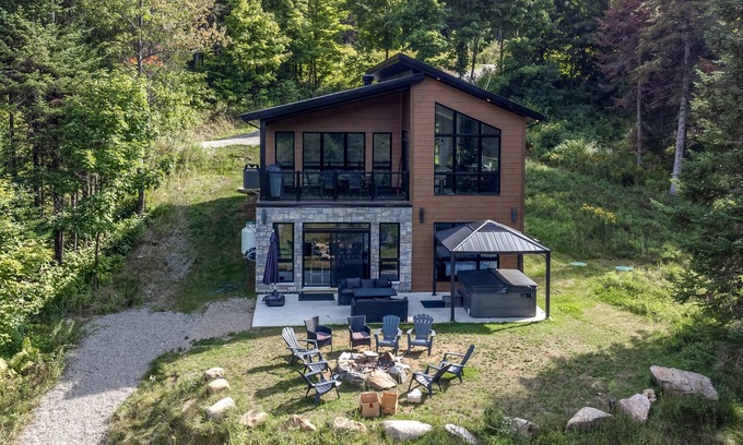 Sainte-Beatrix Ski Chalet | Discover Le Distingué: Waterfront Retreat with Spa & Views
