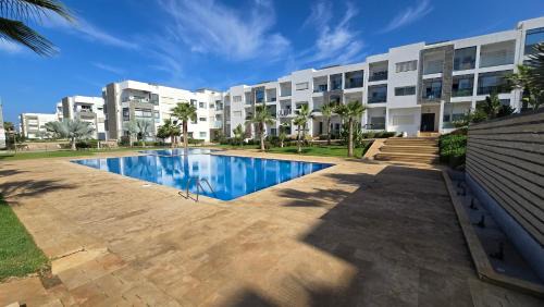Ain Attig Apartment | Discover Le Doux Refuge: 4-Star Family-Friendly Haven