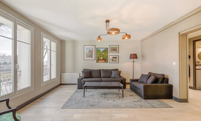 Laval Apartment | Le Gambetta: Modern Apartment with Parking & Netflix Access