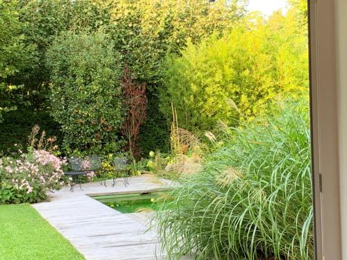 Dion-Valmont Apartment | Discover Le Jardin d'Isa: Family-Friendly with Pool Access