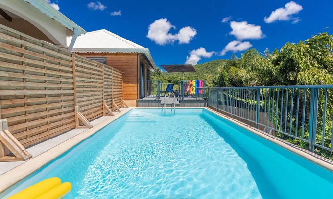 Sainte-Luce House | Relax in Le Kiosque Duplex with Pools and Scenic Terraces