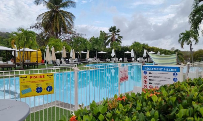 Sainte-Anne Resort | Experience Oceanfront Bliss at Le Mahogany Bleu Hotel