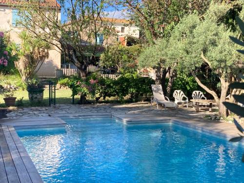 Le Pouget Apartment | Relax at Le Mazet: Oceanfront Retreat with Spa & Pool