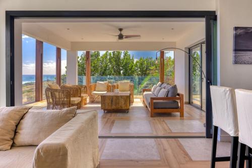 Trois-Bassins Apartment | Unwind at Le Moma: Oceanfront Bliss with Stellar Amenities