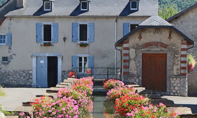 Arudy Cottage | Historic Le Moulin d'Arudy: Canal-Facing Getaway with Spa