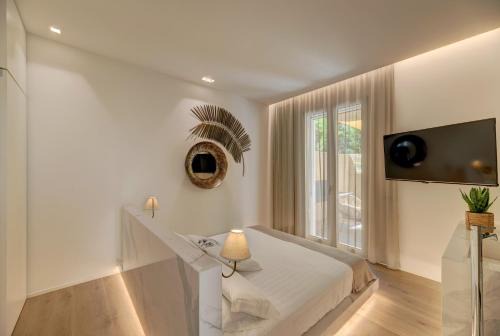 Poetto House | Experience Le Palmette Suites: Oceanfront Bliss Awaits