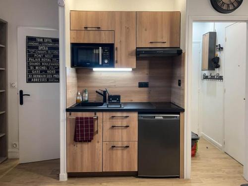 Quartier du Petit-Montrouge Apartment | Discover Le Petit Montsouris - Family-Friendly Retreat