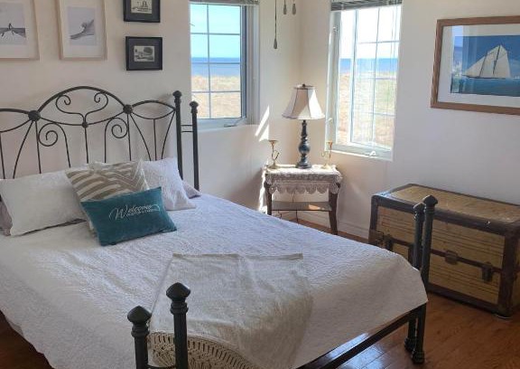 Val-Comeau Bed & Breakfast | Explore Le Phare des Dunes with Oceanfront Views