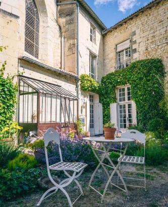 Loudun House | Discover Le Prieuré Sainte Croix: A Cozy Retreat with Dining