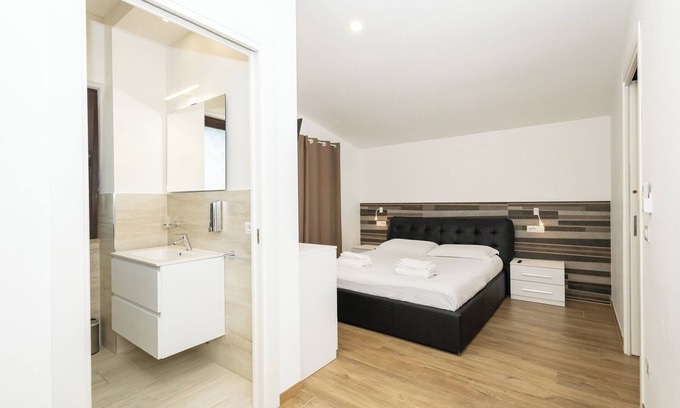 Zona XXX Castel Fusano Apartment | Discover Le Querce: Family-Friendly Retreat in Rome