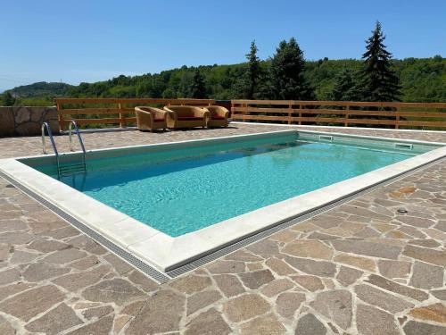 Cernik Apartment | Discover Le Ranch: 4-Star Oceanfront Retreat with Pool