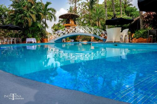 Marcory Hotel | Discover Le Wafou: Poolside Bliss with High Guest Ratings