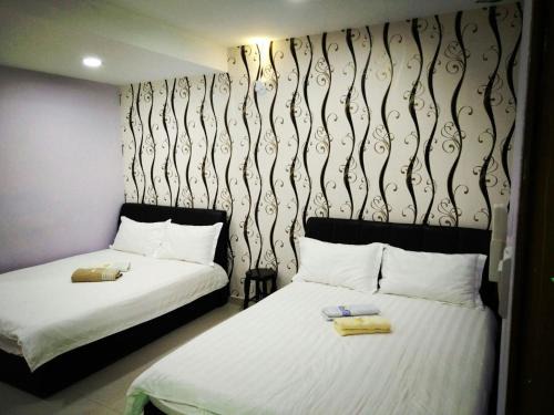 Taman Intan House | Cozy Leaf Guest House: Family-Friendly with Breakfast Included