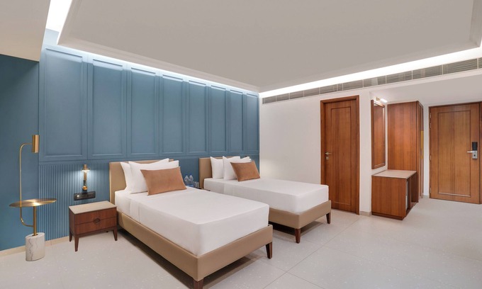Rajkot Hotel | Discover Lemon Tree Hotel Rajkot with Pool and Family Amenities