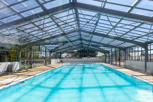 Guerande Resort | Experience Les Cottages de La Baule: Poolside Oceanfront Retreat