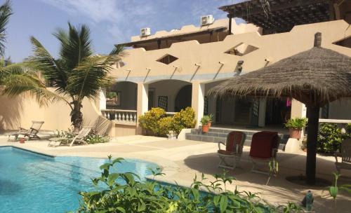 Diakhanor Apartment | Experience Les Filaos: River and Ocean Retreat with Pool