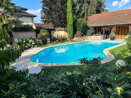 Fortschwihr House | Oceanfront Escape at Les Hortensias with Pool & Family Fun