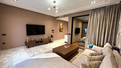 RACINE EXTENSION Apartment | Elegant Les Joyeux Luxury Suites & Appart - 4-Star Retreat