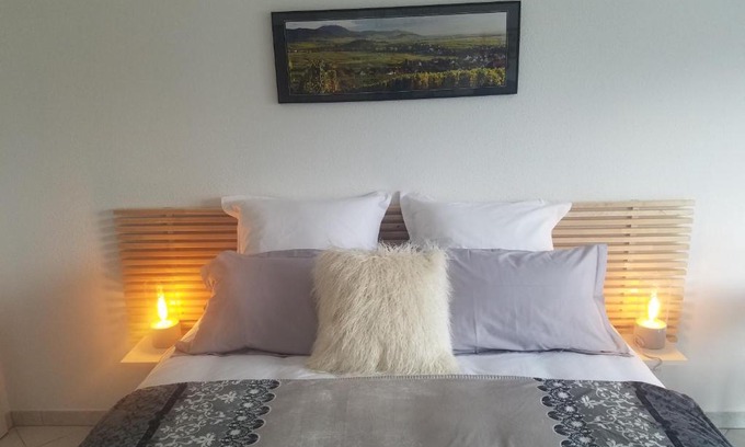 Andolsheim Bed & Breakfast | Discover Les mésanges de l'Ill: Pool & Oceanfront Bliss