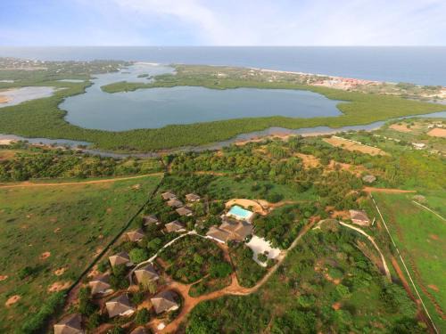Guereo Hotel | Discover Les Manguiers de Guereo: Oceanfront Family Retreat