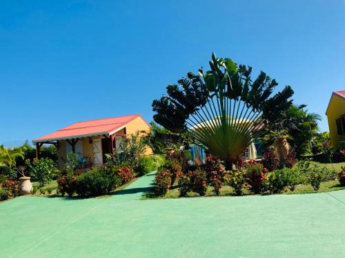 Saint-Louis House | Relax at Les Palmes du Moulin: Oceanfront with Pool & Dining