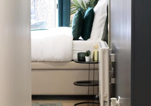 Evreux Apartment | Elegant L’Esmeralda Spa: Relaxing Getaway with Hot Tub