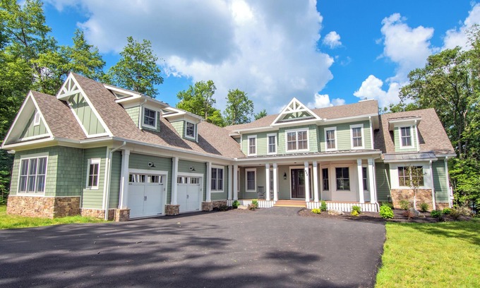 Waterfront Greens House | Unforgettable Lakefront Retreat with Pool & Hot Tubs!