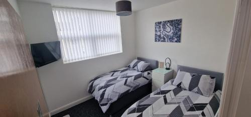 Everton House | Ideal Anfield Retreat: Family-Friendly Home with Parking