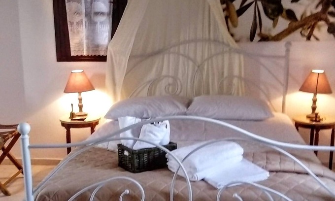 Charouda Apartment | Inviting Liako: Apartment with Balcony & Scenic Village Views