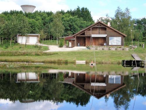 Augignac House | Relax at Lieux-au-lac: Private Beach & Ocean View Awaits