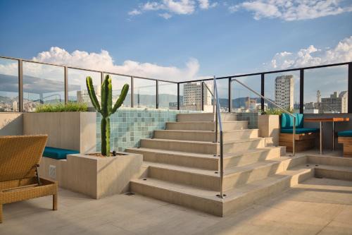Centro Apartment | Discover Life Residence: Oceanfront Retreat with Spa & Pool
