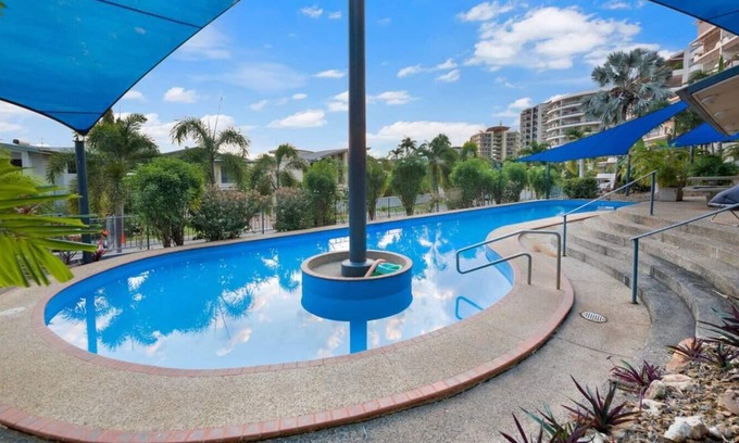 Cullen Bay Apartment | Indulge in Waterfront Residence with Bay Views & Family Amenities