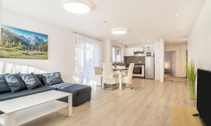 Enzisweiler Apartment | Bright and Modern Apartment “Gartenstraße” with Garden Terrace