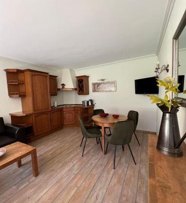 Juodkrante Apartment | Elegant Apartments with Terrace on Serene Street, Rated 9.7