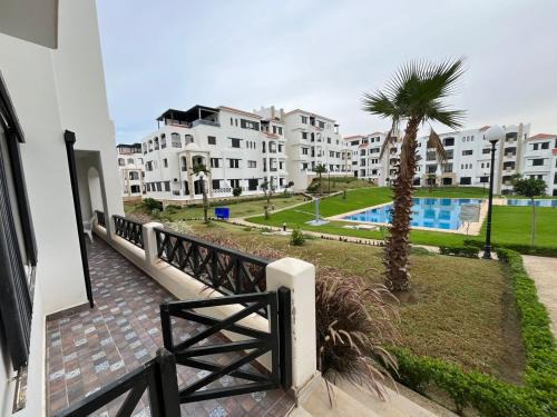 M'diq Apartment | Relax at Lilac's Garden with Pool and Ocean Views