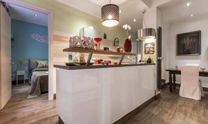 San Teodoro Apartment | Explore Lily's Terrace: Oceanfront Stay Near Downtown