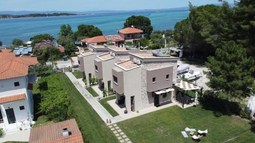Vourvourou Apartment | Explore Limoncello Villas: Oceanfront Bliss & 9.9 Rating