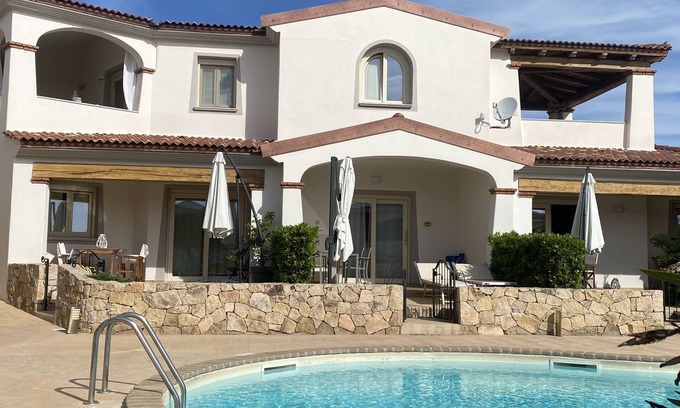 Limpiddu Apartment | Relax at Limpiddu Residence: Pool & Panoramic Ocean Views