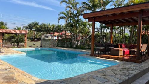 Morada da Praia House | Linda casa com piscina privativa Morada da Praia 3 quartos e 4 banheiros Aceita Pet Wi-fi na casa toda Área gourmet com churrasqueira acomoda até 15 pessoas com muito conforto 2 bicicletas disponíveis para um passeio pelo condomíno