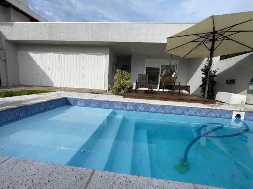 Arroio Teixeira House | Beautiful Beach House with Pool, Pet-Friendly & Family Fun