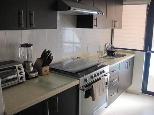 Desarrollo San Pablo Apartment | Inviting Suite with Pool and Green Spaces in Zona Norte