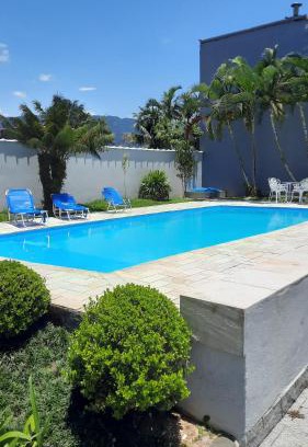 Morada da Praia House | Enchanting Sobrado with Pool in Private Community